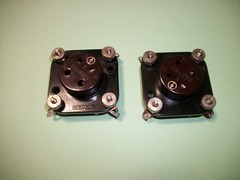 Pair of 4 pin UX-4 breadboard tube sockets from the late 1920s.