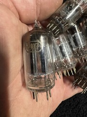 Seven 12AX7 Tubes Black And Gray Plates Untested New Old Stock GE and Others