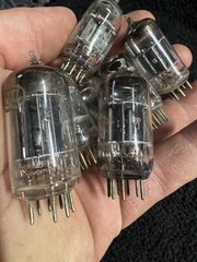 Seven 12AX7 Tubes Black And Gray Plates Untested New Old Stock GE and Others