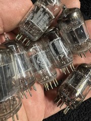 Seven 12AX7 Tubes Black And Gray Plates Untested New Old Stock GE and Others