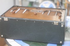 Vintage 1932 General Electric A-81 Portable Radio with tubes, missing cover.