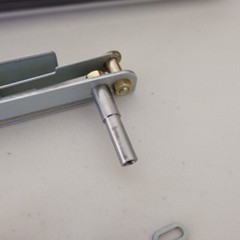 Akai GX-77 Reel to Reel – LEFT Pinch Roller Arm Assembly – Genuine Parts