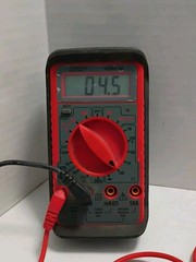 RCA FRONT SPEAKER TESTED WITH A MULTIMETER AND READING 4.5 OHMS SEE PHOTOS