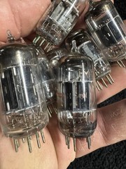 Seven 12AX7 Tubes Black And Gray Plates Untested New Old Stock GE and Others