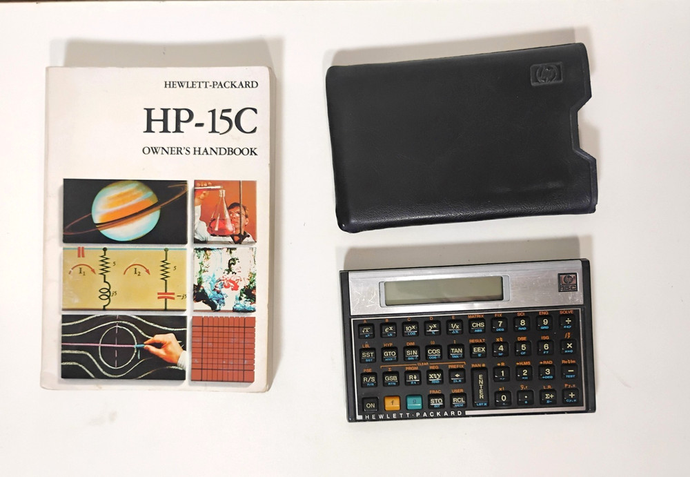 Hewlett Packard HP 15C Scientific Calculator / slipcase / Owner’s Handbook