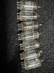 Seven 12AX7 Tubes Black And Gray Plates Untested New Old Stock GE and Others