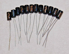 (QTY12) NOS CALRAD 20 MFD 15 VDC RADIAL ELECTROLYTIC CAPACITOR