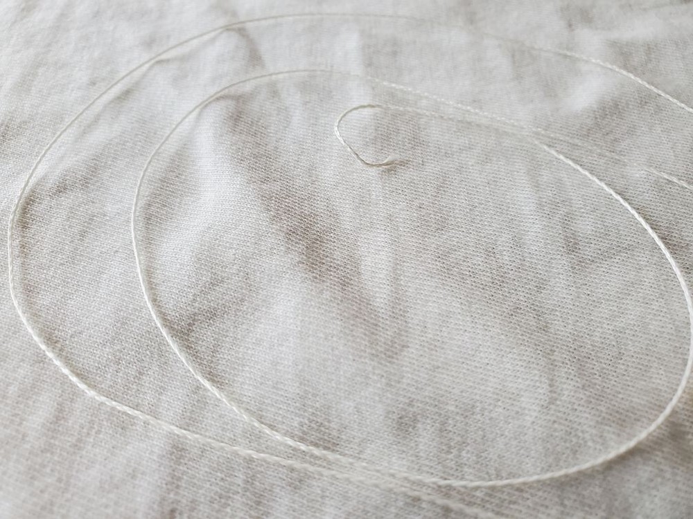 Thin White Radio Dial Cord .2mm sold in 12 foot lengths