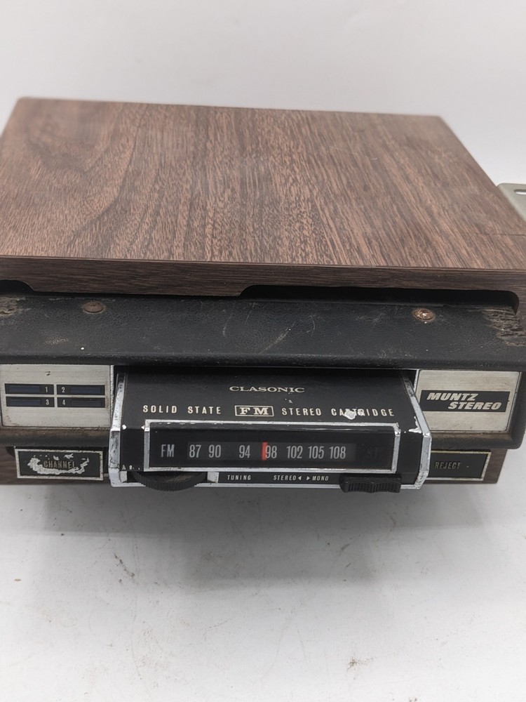 MUNTZ 12 TRACK PLAYS BOTH 4/8 TRACK TAPES WITH FM RADIO CARTRIDGE.