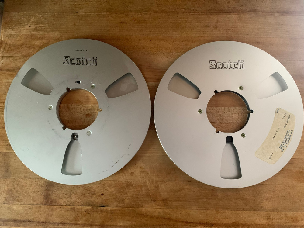 Two Metal scotch 10 1/2″ reel to reels