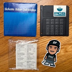 NEW VTG DISKETTE SOLAR CALCULATOR 3.5″ BLACK FLOPPY DISK PCS HEALTH SYSTEMS RARE