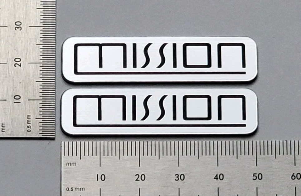 Mission Electronics Badge Logo Emblem Custom Incised Silver Pair With Adhesive