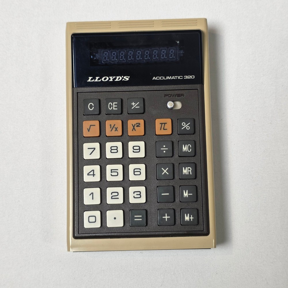 Lloyd’s Accumatic 320 Calculator Tan Brown Vintage VFD Model E320 Japan Tested