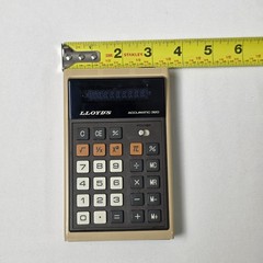 Lloyd’s Accumatic 320 Calculator Tan Brown Vintage VFD Model E320 Japan Tested