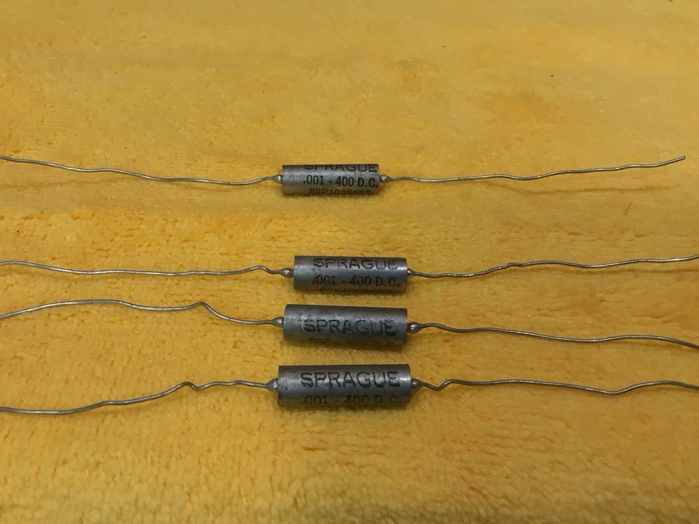 FOUR (4) NOS Sprague PIO Vitamin Q Capacitors .001 – 400VDC. TESTED